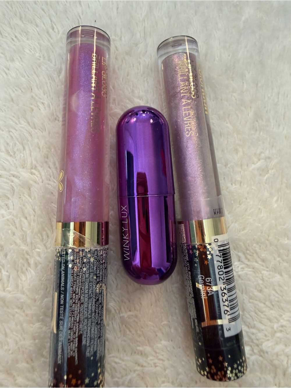 Winky Lux and Wet n wild lilac and purple lipstick and lip gloss tb